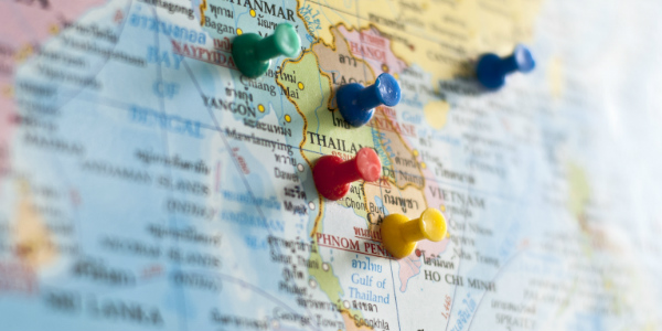 a map of thailand and its neighbours with pins representing comparing international insurance costs