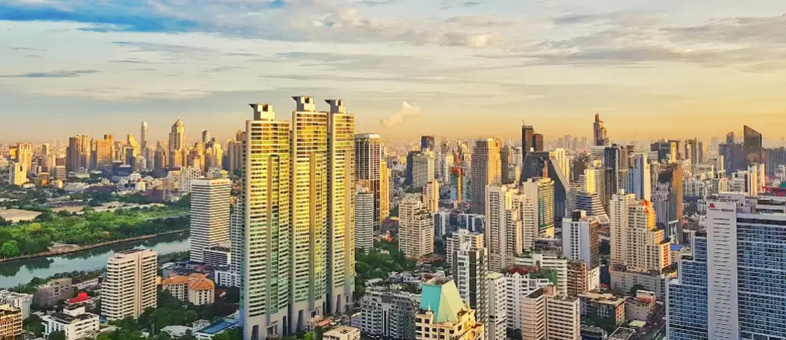 Sky view of buildings in Bangkok city, Thailand at sunset