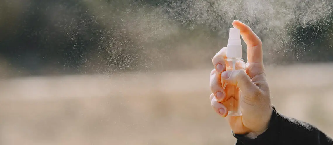 Spraying mosquito repellent as a method to prevent malaria in Thailand.